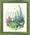 Oval garden and watering can - click for larger image