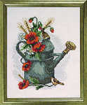 Poppies in watering can - click for larger image