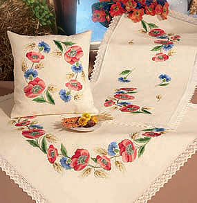 wreath of poppies table cover with lace edging