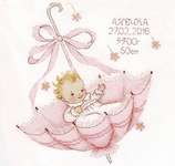 Click/tap for more details of A Little Gift - Girl (cross stitch) by Oven Company
