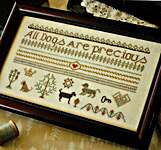 Click/tap for more details of All Dogs Are Precious (cross stitch) by October House