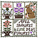 Click/tap for more details of April (cross stitch) by The Prairie Schooler
