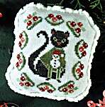Click/tap for more details of Cozy Christmas Cat (cross stitch) by The Blue Flower