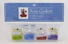 Click for more details of Geranium Embellishment Pack (beads and treasures) by Nora Corbett