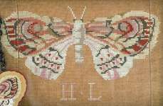 Click/tap for more details of H L's Moth (cross stitch) by Kathy Barrick
