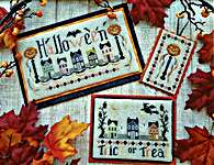 Click/tap for more details of Halloween Street (cross stitch) by Waxing Moon Designs
