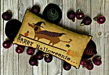 Click/tap for more details of Happy Halloweenie (cross stitch) by Needle Bling Designs