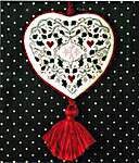 Click/tap for more details of Holly & Hearts Hanging Ornament (cross stitch) by The Sweetheart Tree