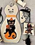Click/tap for more details of Jinx And Hex (cross stitch) by Twin Peak Primitives