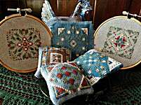 Click for more details of Lil Stitches - July (cross stitch) by Carolyn Manning