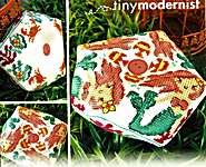 Click/tap for more details of Mermaid Biscornu (cross stitch) by Tiny Modernist