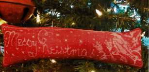 Click/tap for more details of Merry Christmas Pin Pillow (cross stitch) by Dames of the Needle