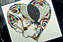 Click/tap for more details of Metamorphosis - Butterfly & Poppy (cross stitch) by MarNic Designs