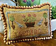 Click/tap for more details of Mini Spring Sampler (cross stitch) by Frog Cottage Designs