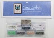 Click for more details of Miss Goss Swallowtail Embellishment Pack (beads and treasures) by Nora Corbett
