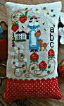 Click/tap for more details of Miss Strawberry (cross stitch) by Twin Peak Primitives