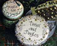 Click/tap for more details of Mistletoe, Tinsel and Jingles (cross stitch) by Heartstring Samplery