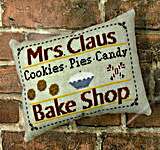 Click/tap for more details of Mrs. Claus Bake Shop (cross stitch) by Needle Bling Designs