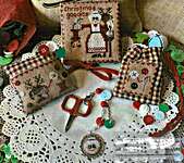 Click/tap for more details of Mrs. Claus Goodies Sewing Set (cross stitch) by Mani di Donna