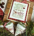 Click/tap for more details of Naughty or Nice? (cross stitch) by Erica Michaels