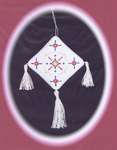 Click/tap for more details of Noel Ornament (cross stitch) by A Stitch in Time