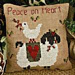 Click/tap for more details of Peace on Heart (cross stitch) by Mani di Donna