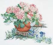 Click/tap for more details of Pink Hydrangeas and Blue Pansies (cross stitch) by Thea Gouverneur