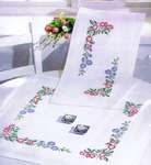 Click for more details of Pink Roses and Blue Daisies Table Covers (embroidery) by Permin of Copenhagen