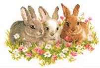 Click for more details of Rabbits in a Field of Flowers (cross stitch) by Vervaco