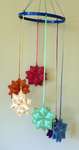 Click/tap for more details of Rainbow Mobile (tapestry) by Anne Peden