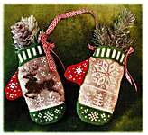 Click for more details of Reindeer in Flight Mittens (cross stitch) by Blackberry Lane Designs