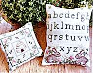 Click/tap for more details of Sampler Di Primavera - Spring Sampler (cross stitch) by Serenita di Campagna