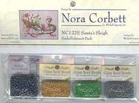 Click/tap for more details of Santa's Sleigh Embellishment Pack (beads and treasures) by Nora Corbett