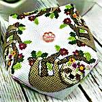Click/tap for more details of Sloth Biscornu (cross stitch) by Tiny Modernist