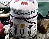 Click/tap for more details of Springtime Pin Drum (cross stitch) by Heartstring Samplery