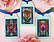 Click/tap for more details of Stained Glass Flowers (cross stitch) by Frony Ritter Designs
