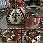 Click/tap for more details of Strawberry Petal Pincushion (cross stitch) by Mani di Donna