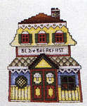 Click for more details of Summer in the Village (cross stitch) by Stoney Creek