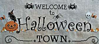 Click/tap for more details of Welcome To Halloween Town  (cross stitch) by Serenita di Campagna