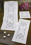 Click for more details of White Table Mats with Mauve Medallions (hardanger) by Permin of Copenhagen
