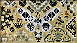 Click/tap for more details of White Winter Moth (cross stitch) by Kathy Barrick