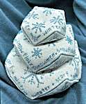 Click/tap for more details of Winter Biscornu Stack (cross stitch) by Works by ABC