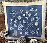 Click/tap for more details of Winter Quaker - Snowy Owls (cross stitch) by Rebel Stitcher