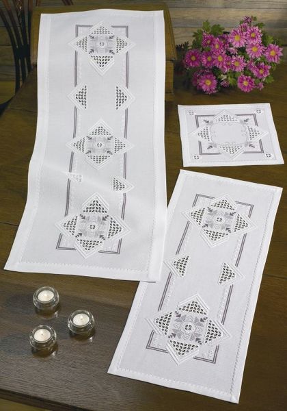White Table Mats with Mauve Medallions