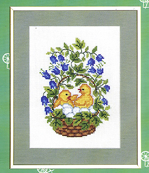 Easter Chickens and Eggs in a Basket