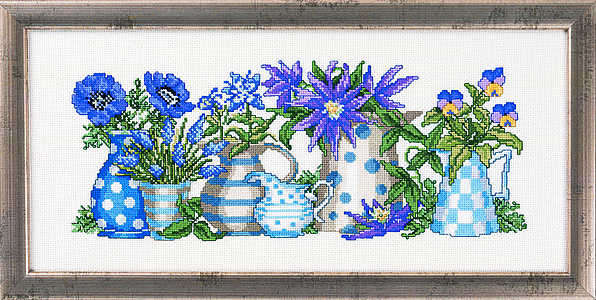 Blue flowers in blue jugs - click for larger image