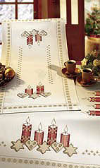 Candles and gingerbread table cover