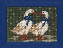 Two geese with bows